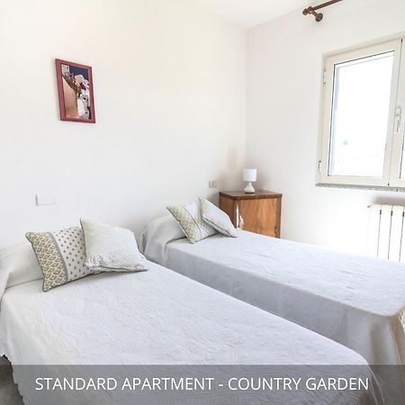Homey Experience - Country Inn Apartments Garden & Seaview Golfo Aranci Eksteriør billede